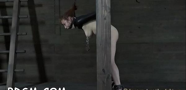  Slave receives lusty booty whipping before pussy torturing